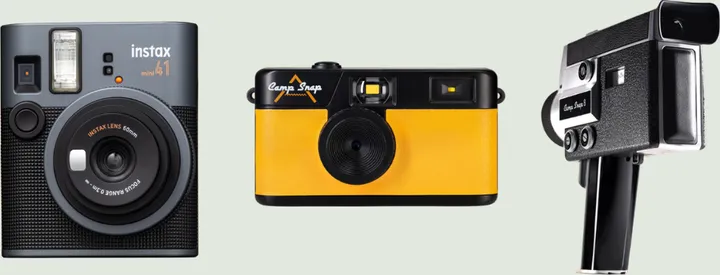 An Instax instant camera, a yellow Camp Snap camera, and a handheld video camera