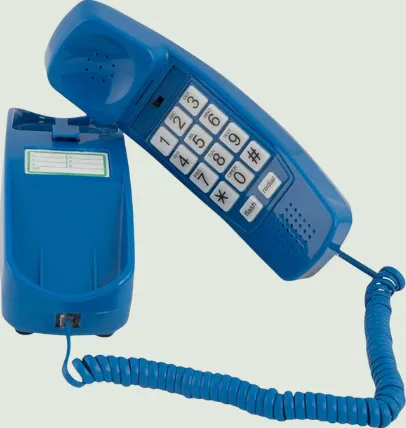 A blue corded wall phone