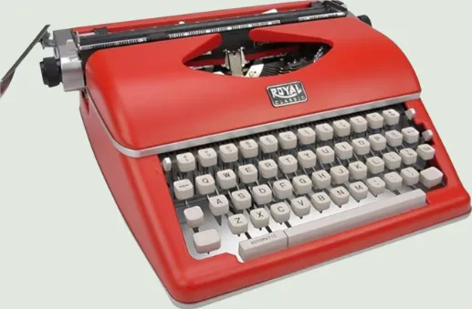 A red Royal manual typewriter
