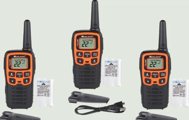 Three orange and black Midland walkie-talkies